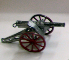 silver%20portable%20toy%20cannon%20with%20moveable%20red%20wheels